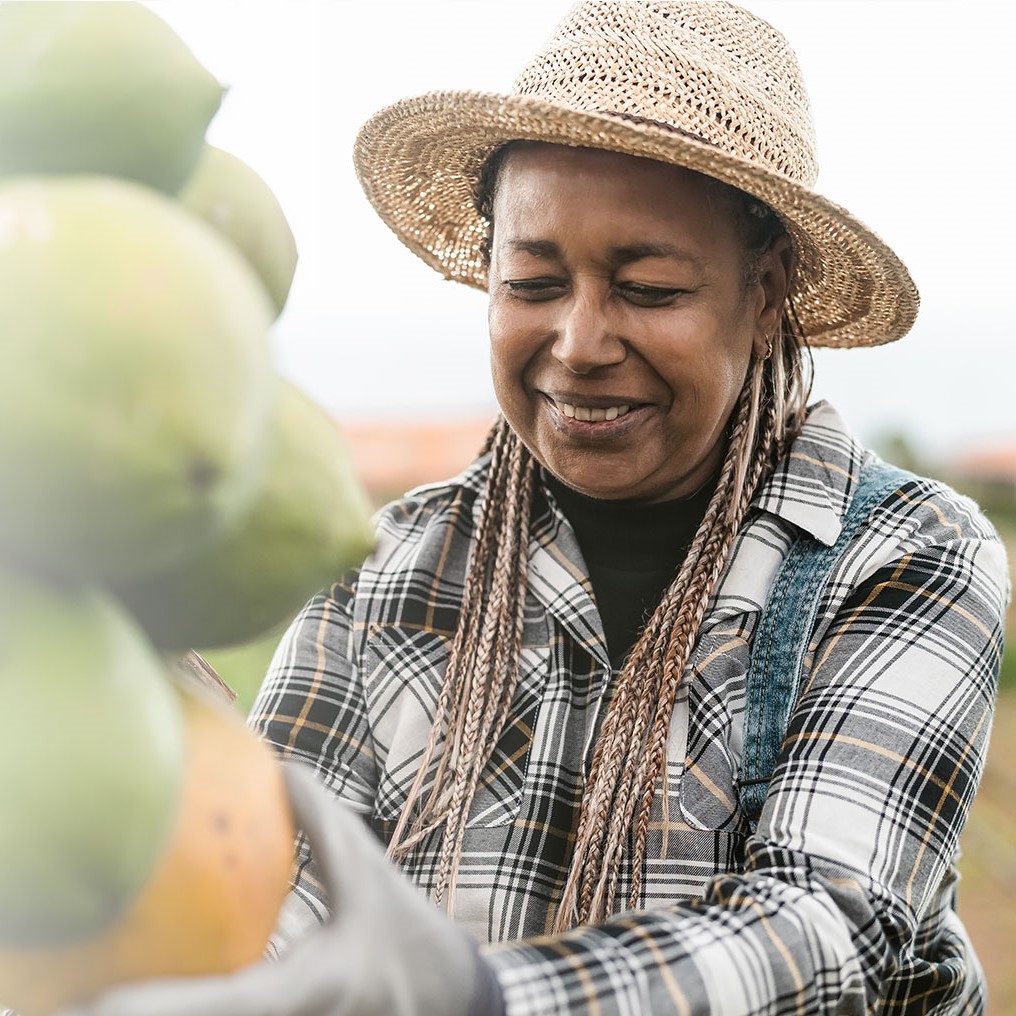 Woman pulling fruit